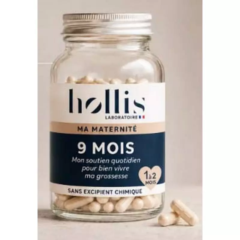 Pot de complément grossesse Hollis 9 mois 90 gélules sur fond beige, gélules beiges près du flacon e