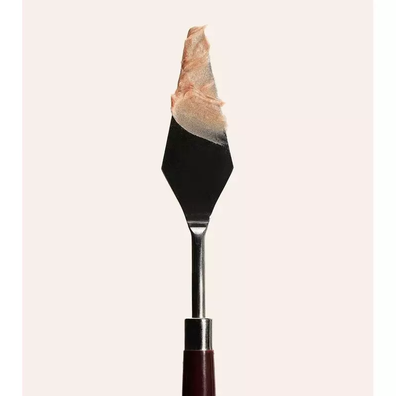 Détail du produit Embryolisse Baume couleur stick 3 en 1 Champagne - 2,5 g, texture satinée et embal