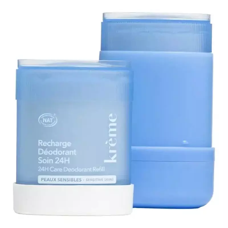 Recharge de déodorant soin 24H Krème à côté de son étui stick bleu rechargeable pour peaux sensibles
